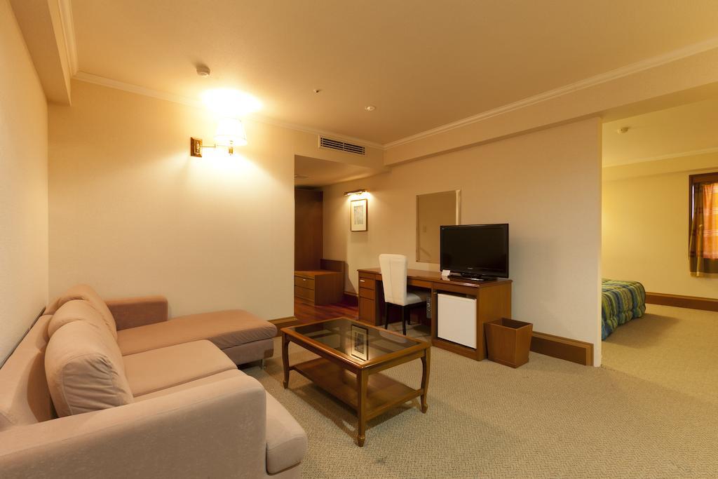 Station Hotel Au Tsu Rum bild